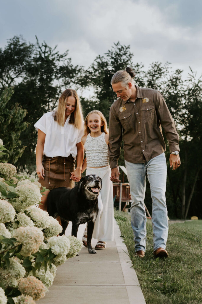 pittsburgh family in front of their home with dog